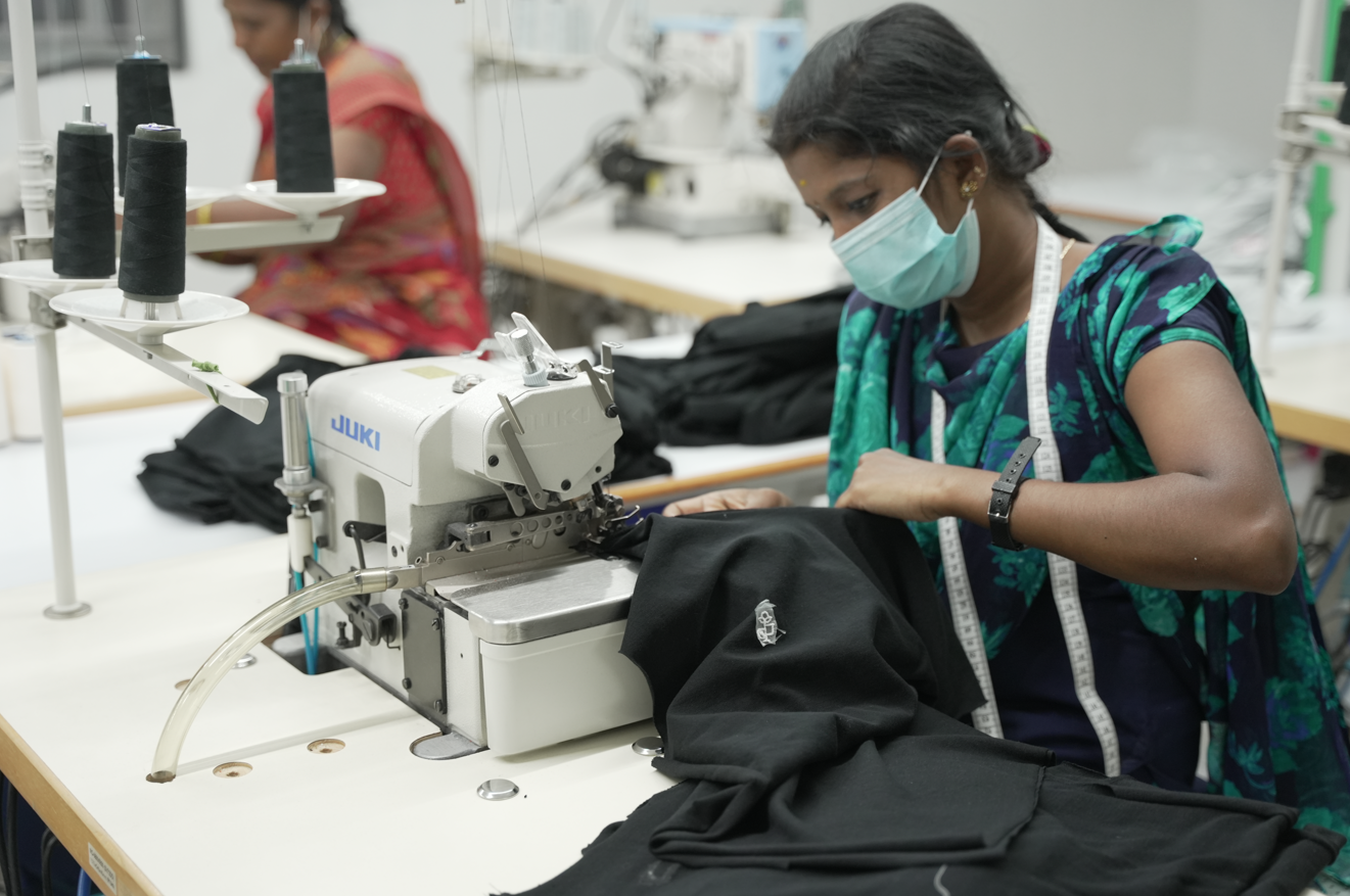 Ethical manufacturing of 2512 Pacchis Barah sustainable t-shirts, using organic cotton t-shirts and eco friendly t-shirts. Skilled women workers crafting organic cotton tee with fair trade practices, showcasing sustainable tshirts for men and women.