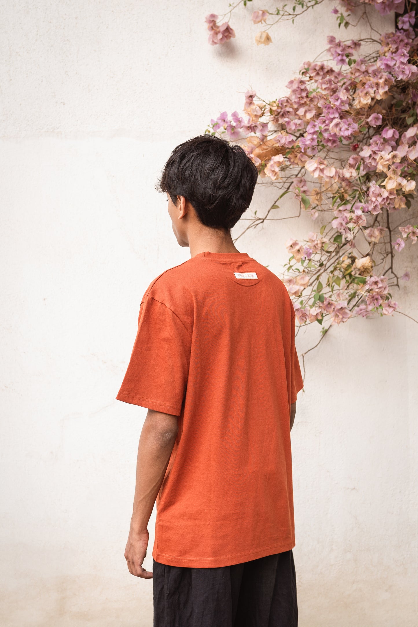 Back view of rust t-shirt, relaxed and breathable design